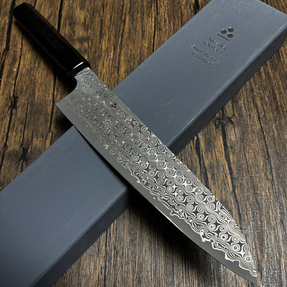 Japanese-origin Nigara  chef's knife, 240mm  Suitable for household use, it is a versatile knife for cutting vegetables and meat. Made of Damascus SG2 powdered steel, it is a multi-functional chef's knife, including a beef knife.